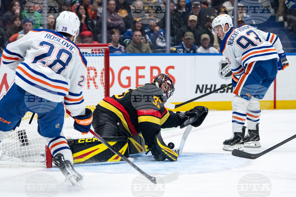 Oilers Canucks Hockey