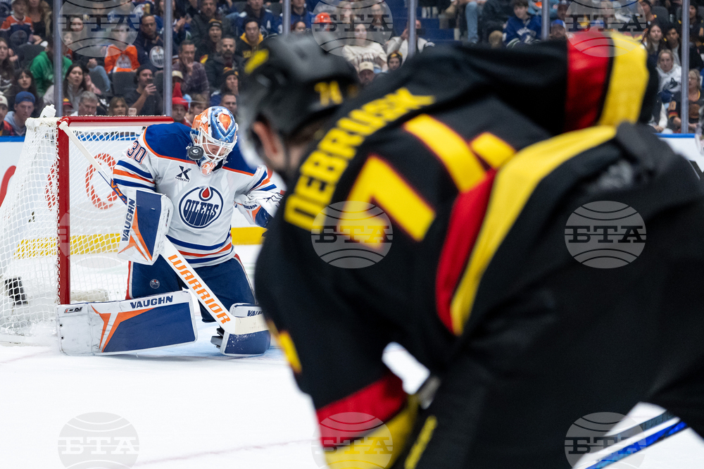Oilers Canucks Hockey