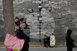 APTOPIX China US Digital Cage Photo Gallery