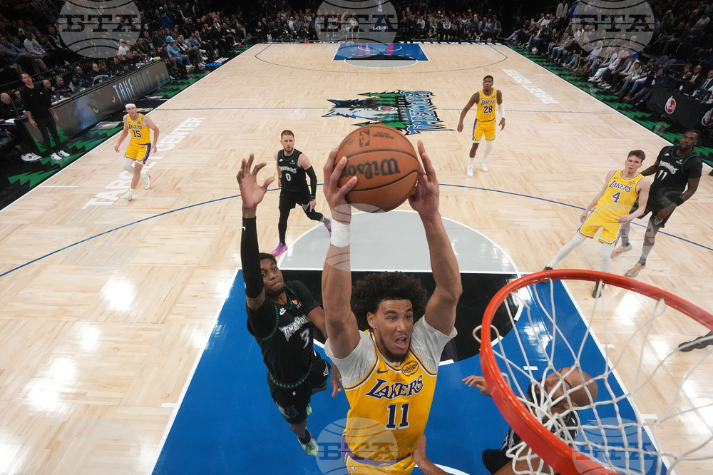 APTOPIX Lakers Timberwolves Basketball