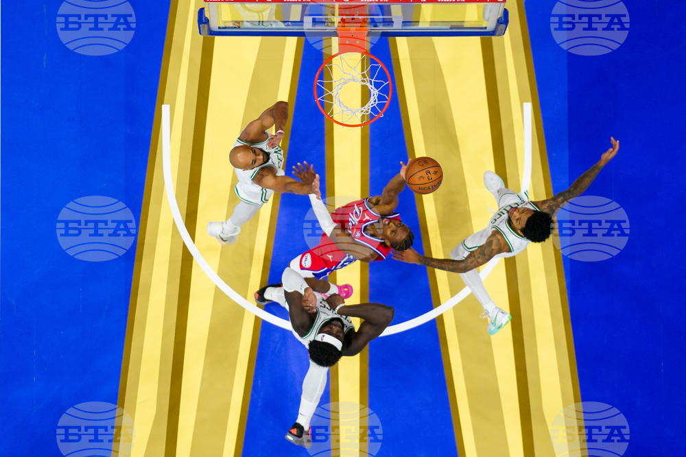 AP TOPIX Celtics 76ers Basketball