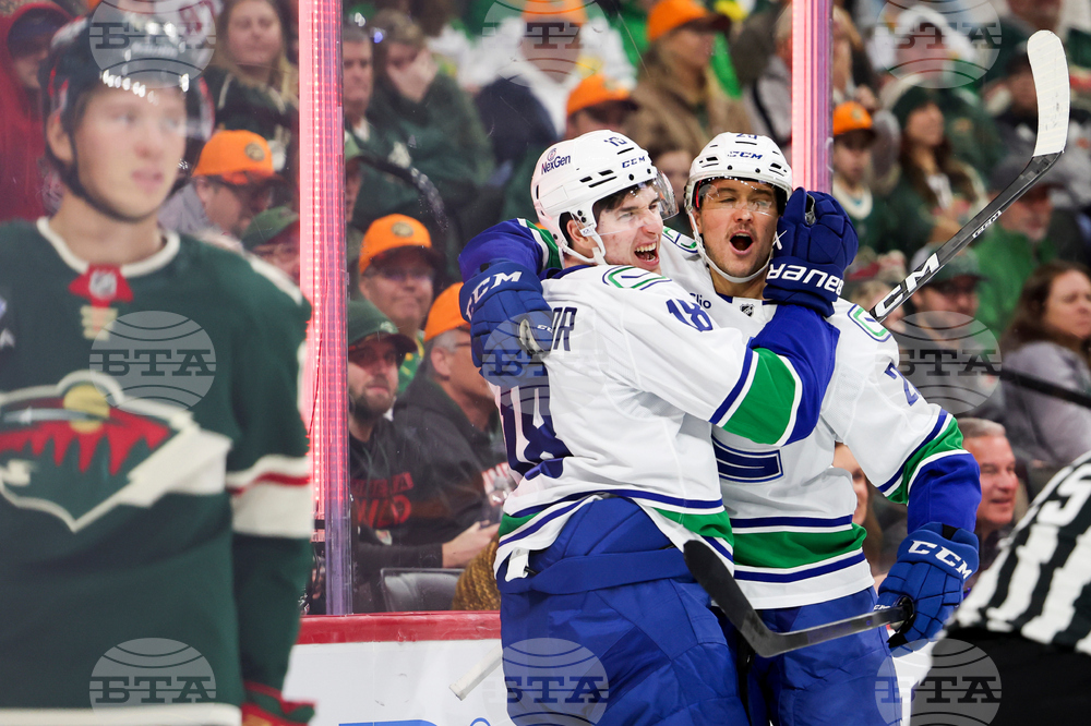 APTOPIX Canucks Wild Hockey