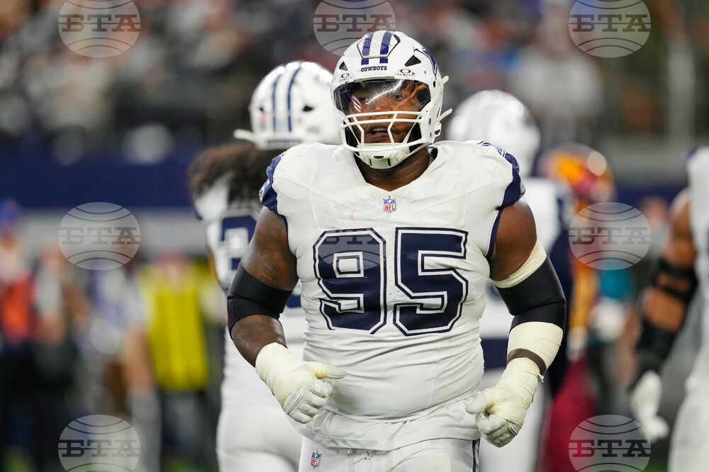 Cowboys-Clark's New Groove Football