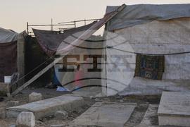 Mideast Wars Living in Cemeteries