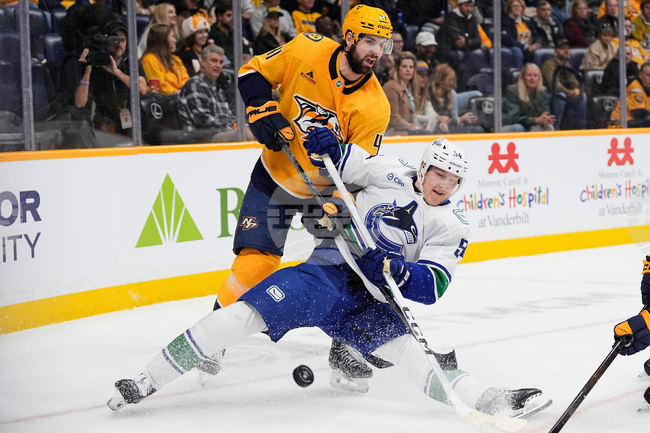 APTOPIX Canucks Predators Hockey