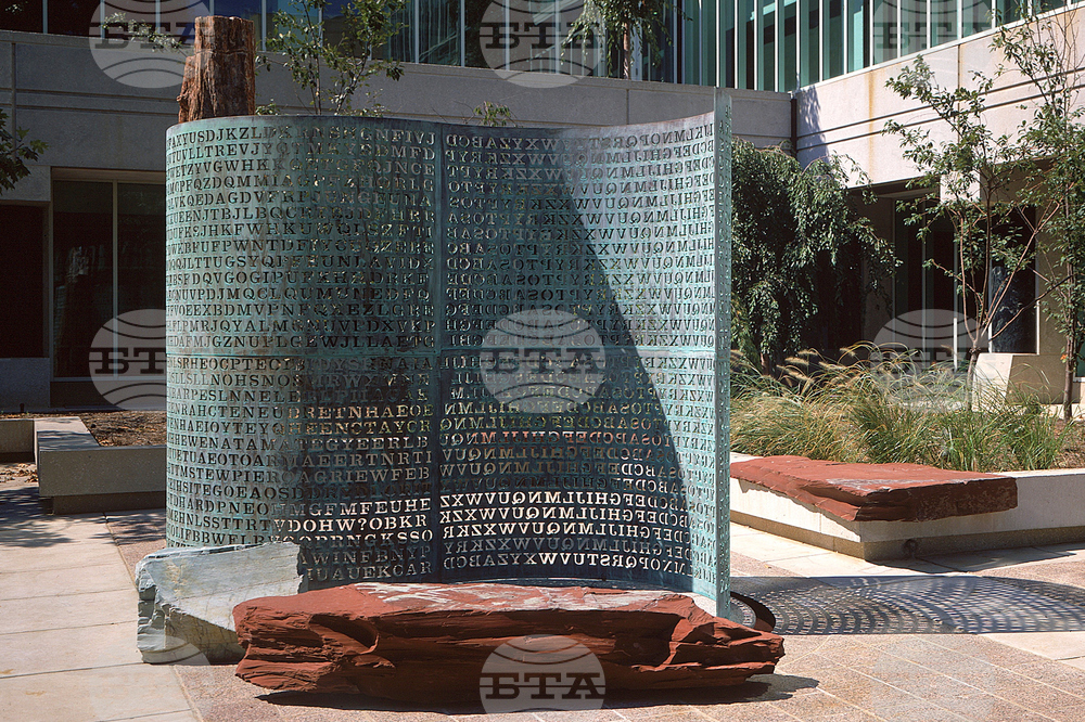 Encrypted Code Auction