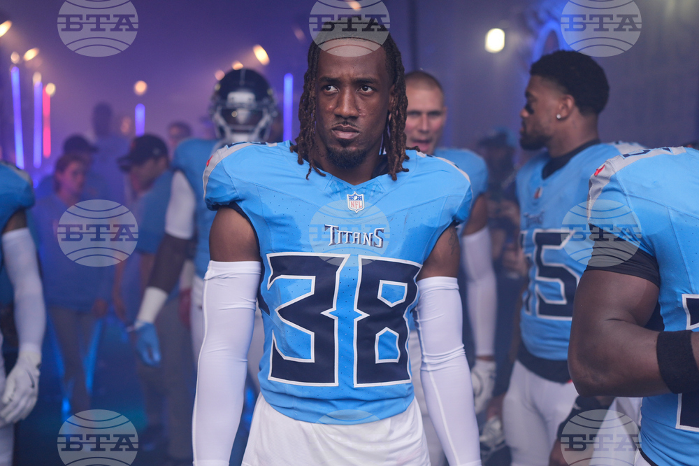 Titans Sneed Shooting Football