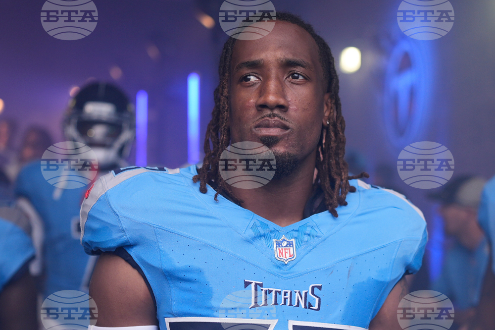 Titans Sneed Shooting Football