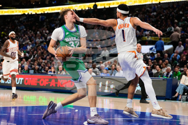 APTOPIX Suns Mavericks Basketball