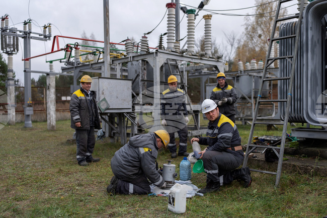 CORRECTION Russia Ukraine War Energy Workers Photo Essay