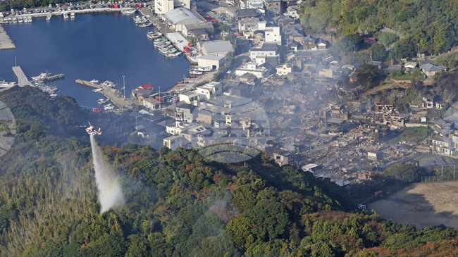 Един човек е в неизвестност след огромен пожар, причинил щети на над 170 сгради в японски град