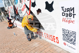 At G20 Summit in Johannesburg, Massive Mural Demands Debt Justice