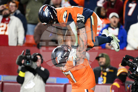 APTOPIX Broncos Commanders Football