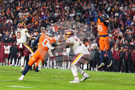 APTOPIX Broncos Commanders Football