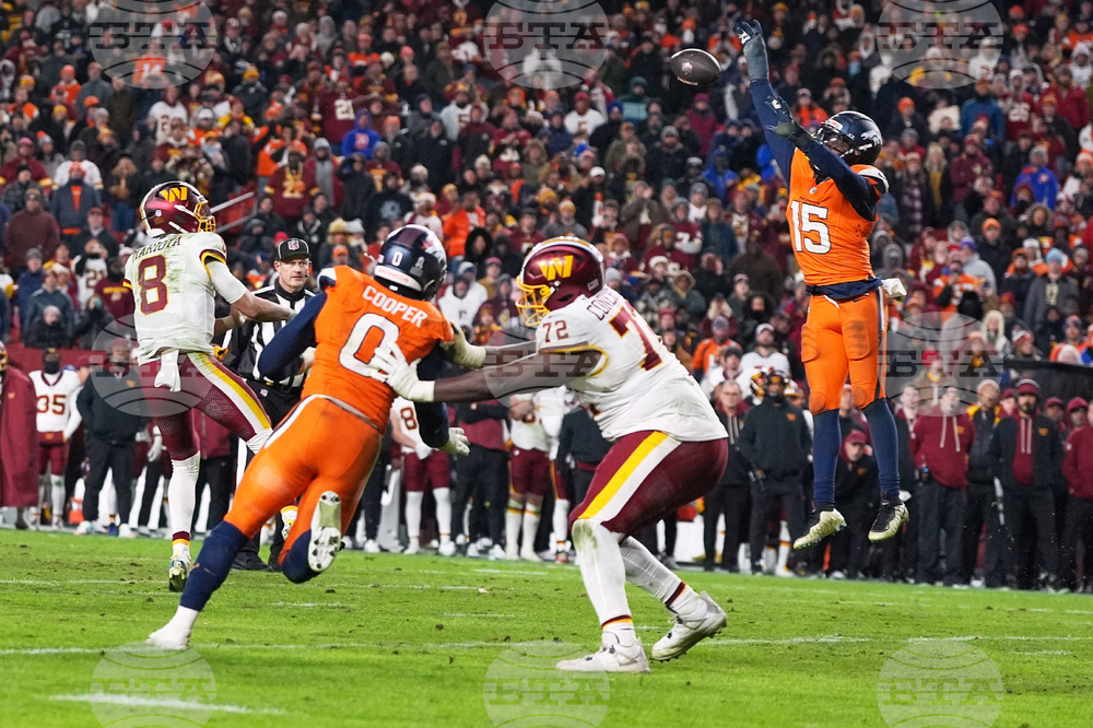 APTOPIX Broncos Commanders Football