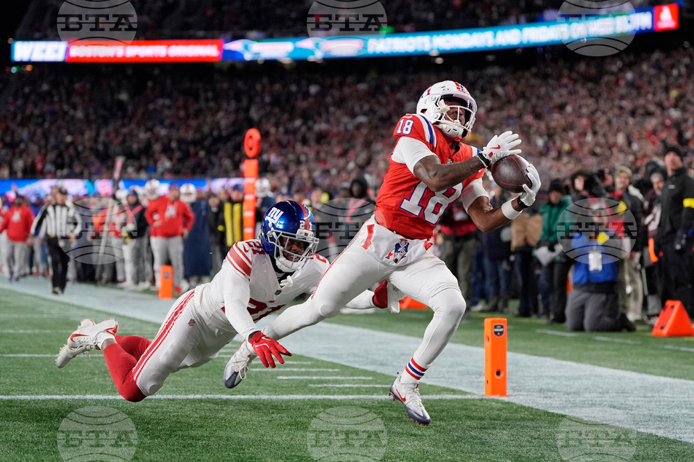 APTOPIX Giants Patriots Football