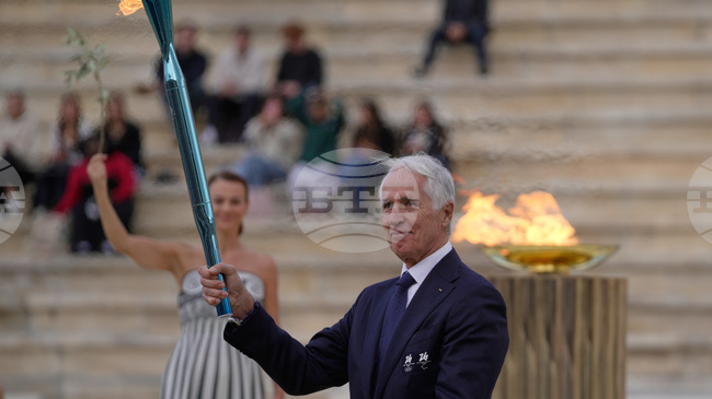 Олимпийският огън за 25-ите Зимни игри през 2026 година в Италия беше предаден на организаторите на церемония в Атина