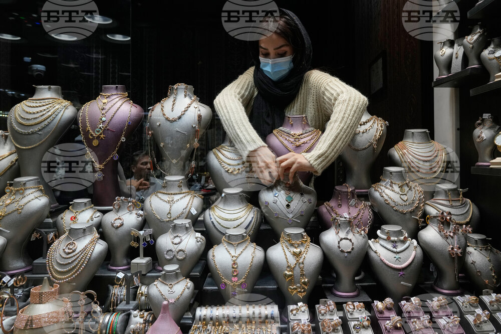 APTOPIX Iran Portable Wealth