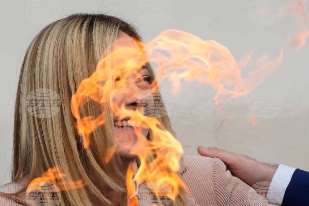 APTOPIX Italy Olympics Milan Cortina Flame