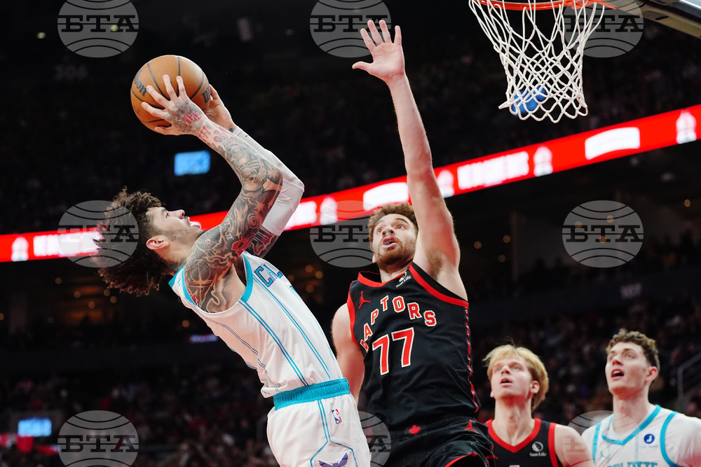 Hornets Raptors Basketball