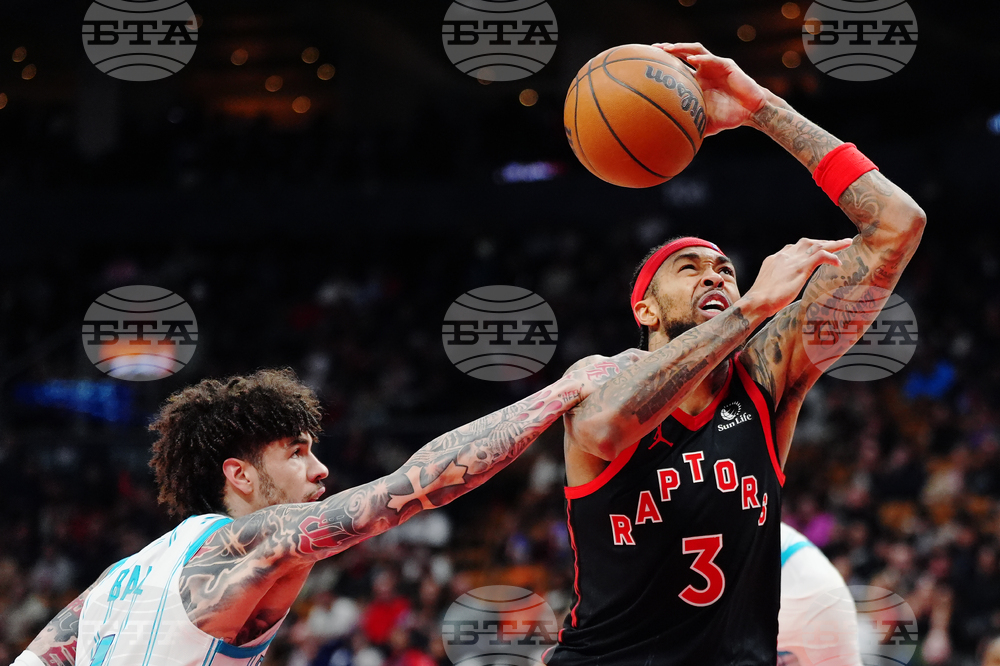 Hornets Raptors Basketball