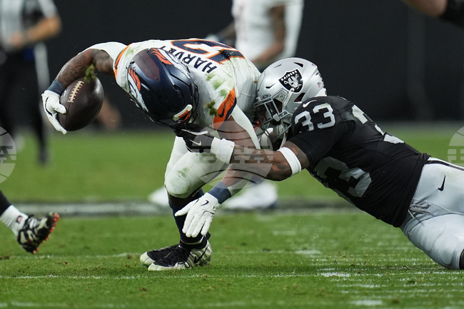 APTOPIX Broncos Raiders Football