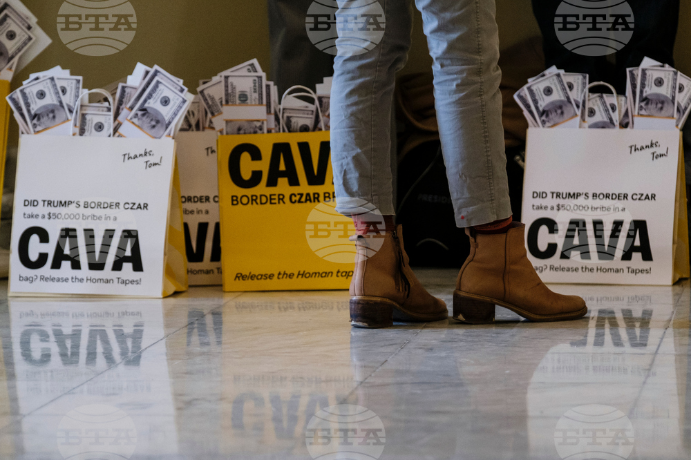 Activists Expose Border Czar with Cava "Bribe Bags"