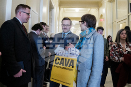 Activists Expose Border Czar with Cava "Bribe Bags"