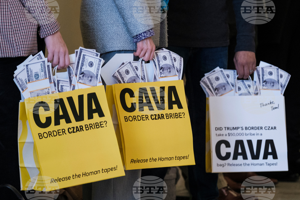 Activists Expose Border Czar with Cava "Bribe Bags"