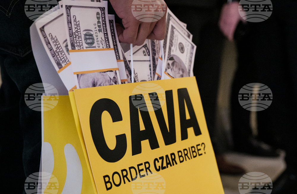 Activists Expose Border Czar with Cava "Bribe Bags"