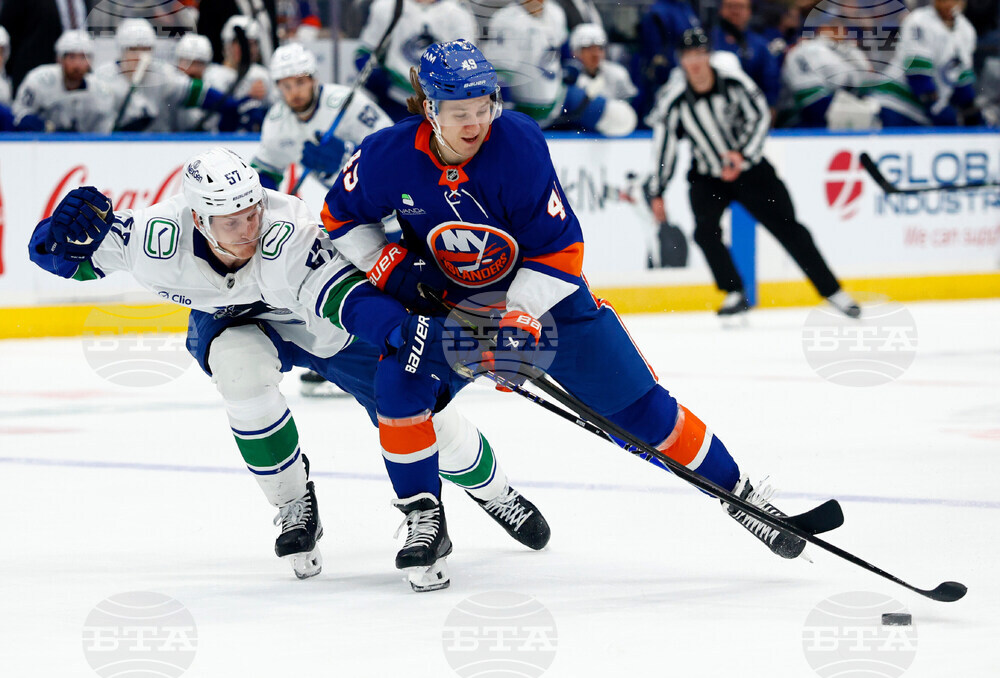 Canucks Islanders Hockey