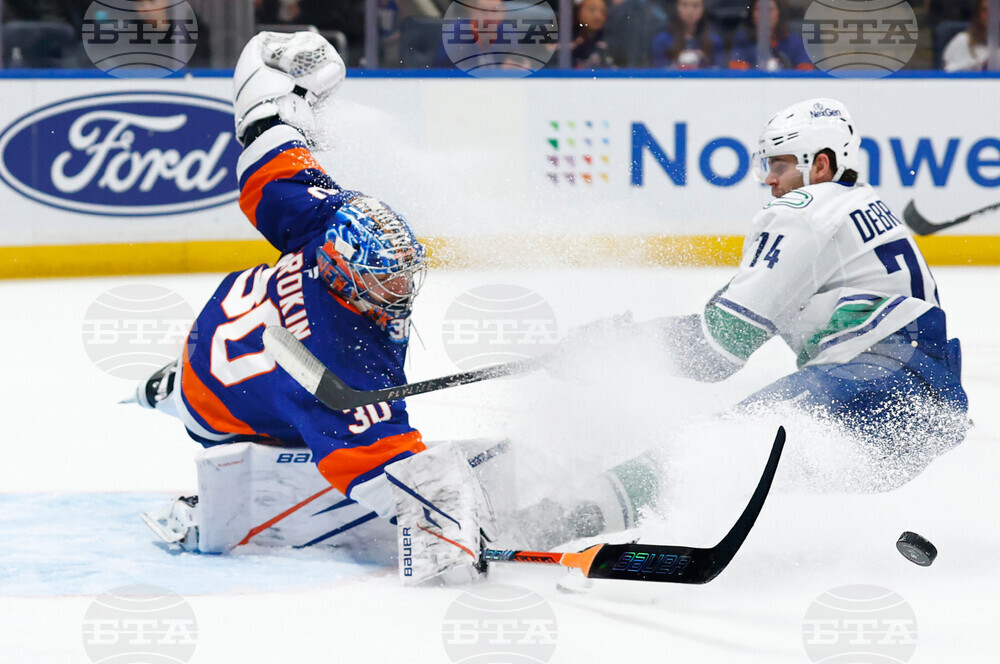 Canucks Islanders Hockey