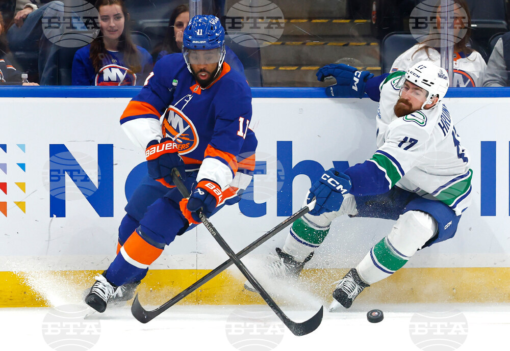 Canucks Islanders Hockey