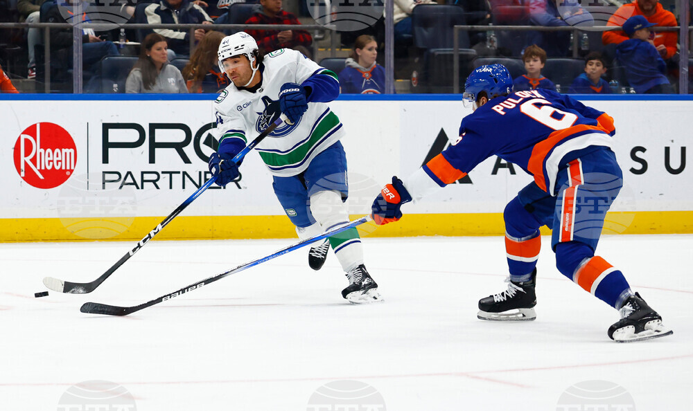 Canucks Islanders Hockey