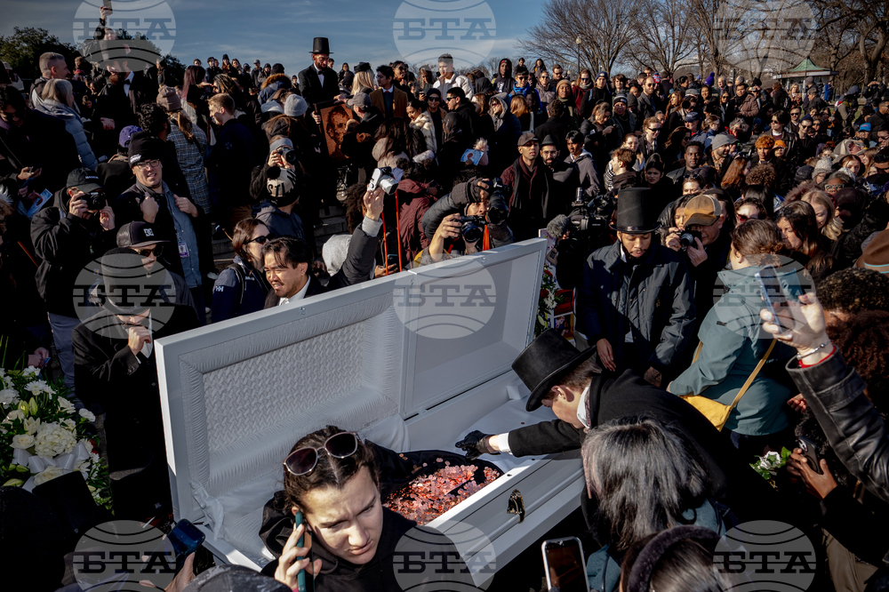 APTOPIX Penny Funeral