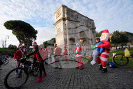 Italy Cycling Santa Clauses