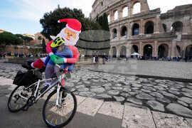 Italy Cycling Santa Clauses