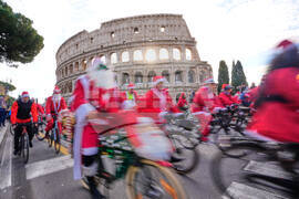 Italy Cycling Santa Clauses