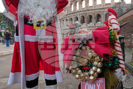 Italy Cycling Santa Clauses