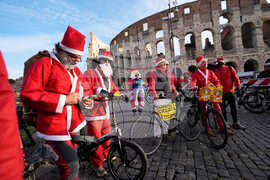 Italy Cycling Santa Clauses