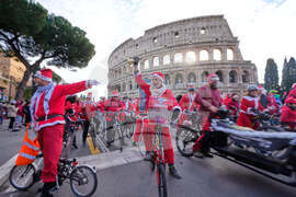 Italy Cycling Santa Clauses