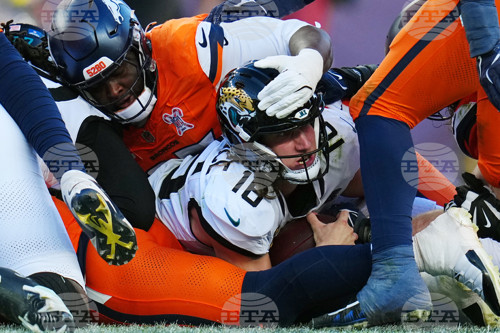 APTOPIX Jaguars Broncos Football