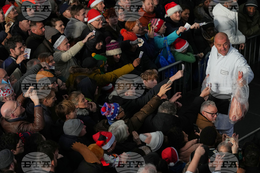 Britain Christmas Eve Meat Market