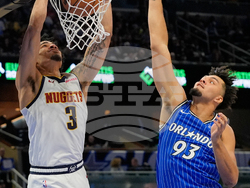 APTOPIX Nuggets Magic Basketball