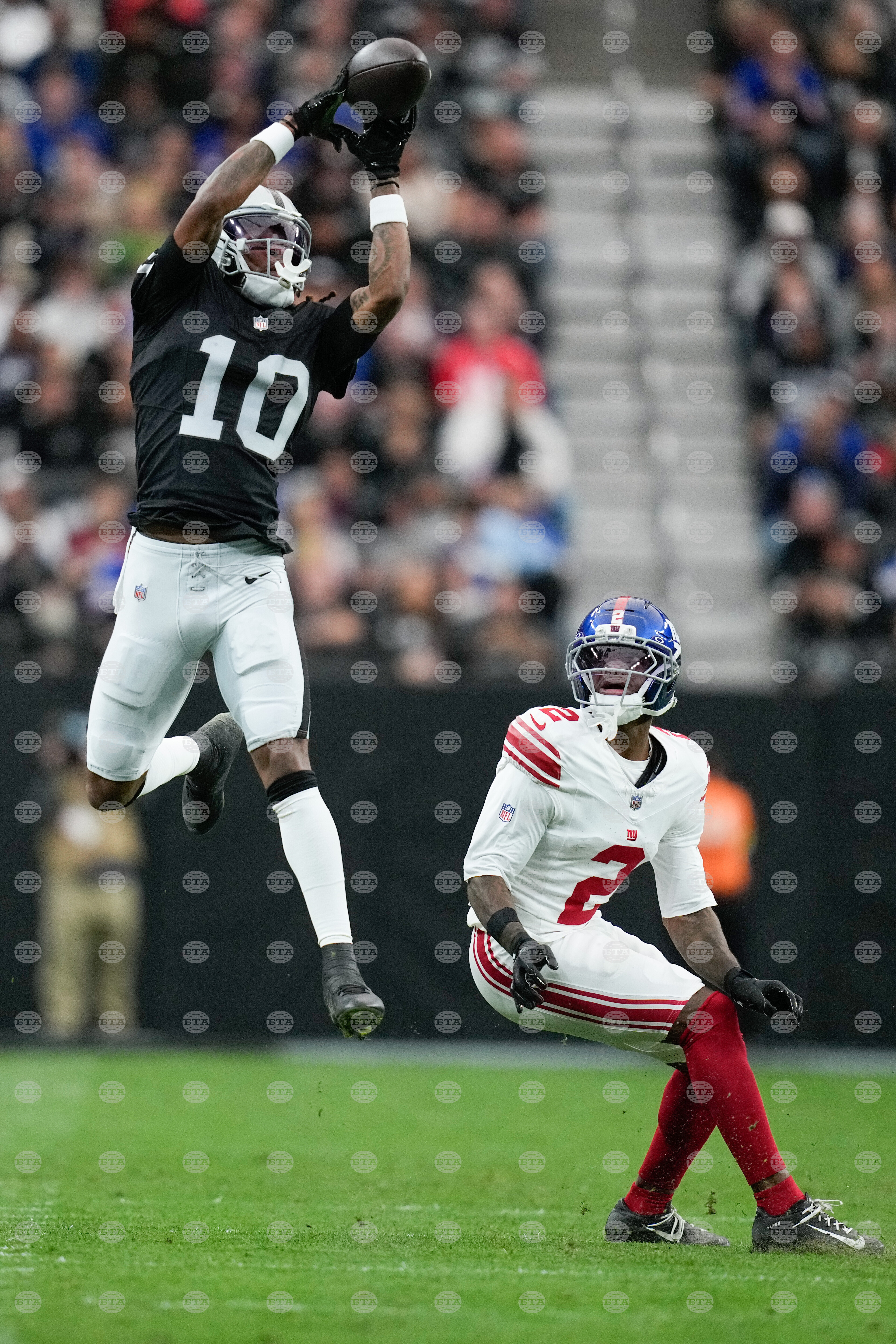 APTOPIX Giants Raiders Football