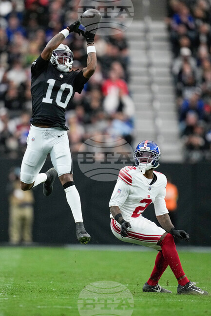 APTOPIX Giants Raiders Football