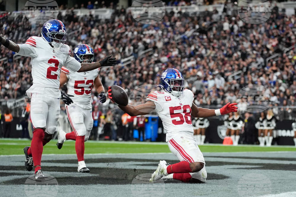 APTOPIX Giants Raiders Football