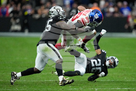 APTOPIX Giants Raiders Football