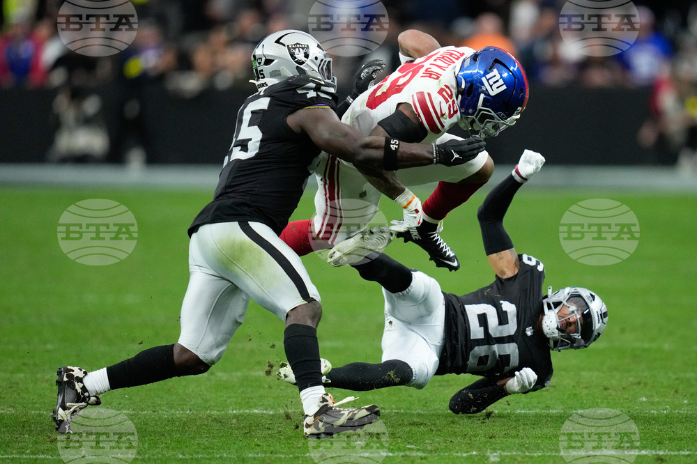 APTOPIX Giants Raiders Football