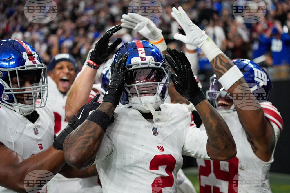 APTOPIX Giants Raiders Football